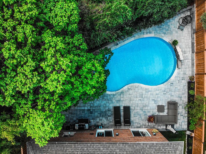 Backyard Poolside Retreat with Interlocking Pavers