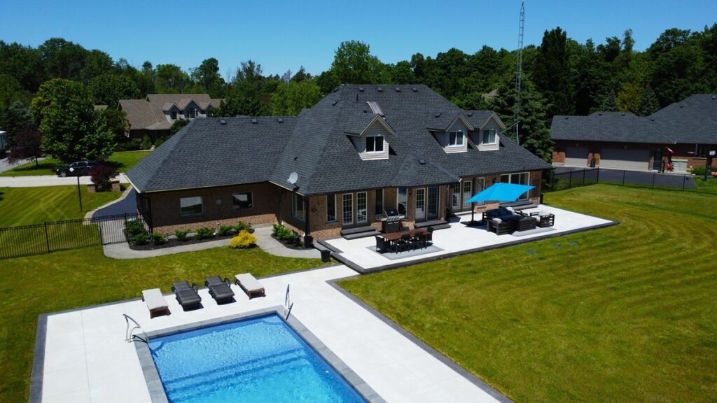 Complete Backyard Makeover with Modern Limestone Concrete Patio, Pool Deck and Fire Pit