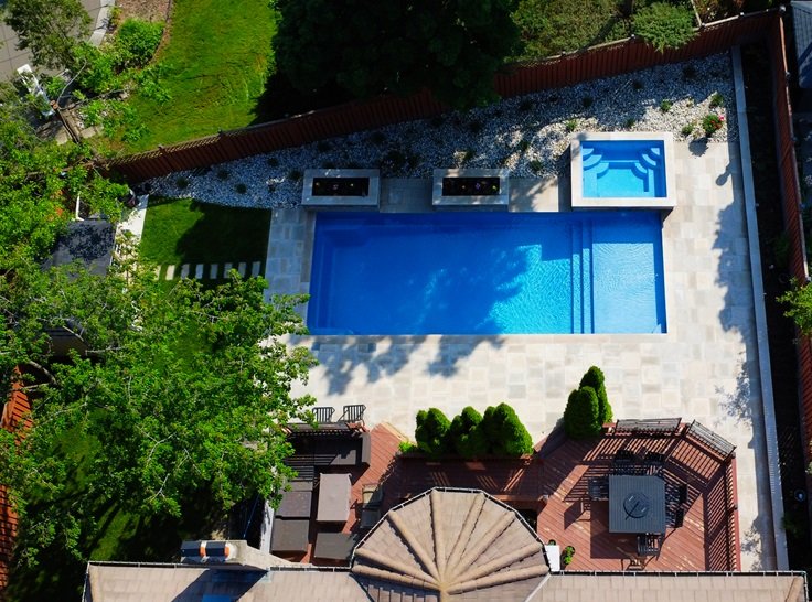Luxury Backyard Transformation with Natural Stone Landscaping and Pool Install